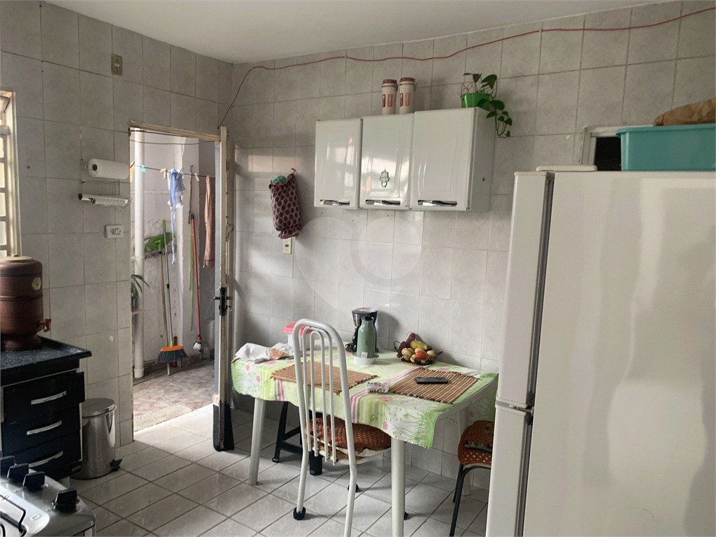 Terreno com Duas Casas – Oportunidade com Renda!