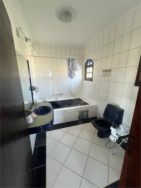 Casa à venda com 4 quartos, 220m² - Foto 11
