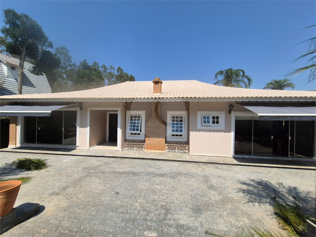 Casa de Condomínio à venda e aluguel com 5 quartos, 244m² - Foto 2