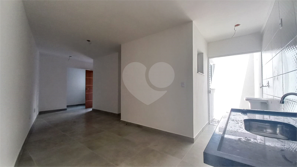 Apartamento à venda no Mandaqui localizado no térreo com um pequeno quintal.