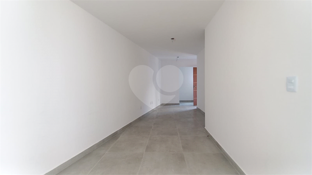 Apartamento à venda no Mandaqui localizado no térreo com um pequeno quintal.