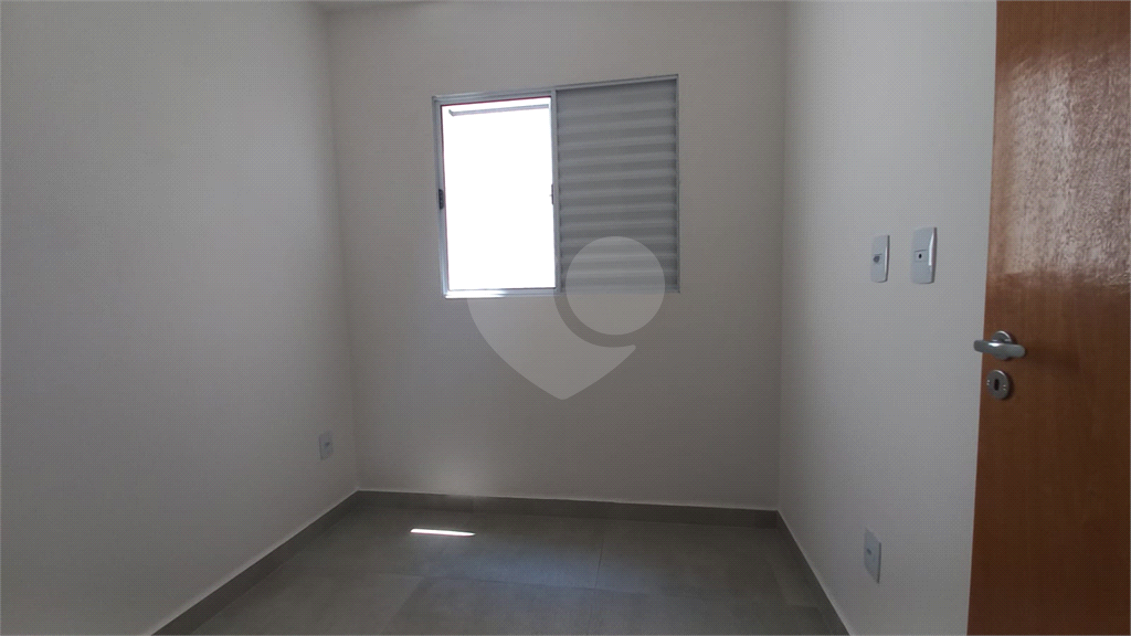 Apartamento à venda no Mandaqui localizado no térreo com um pequeno quintal.