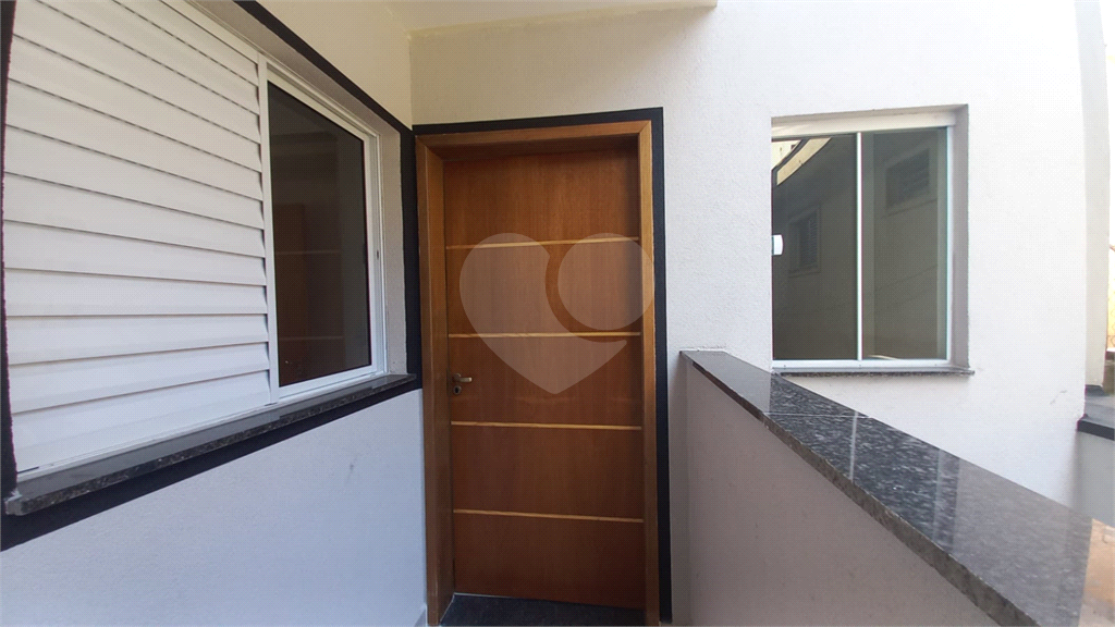 Apartamento à venda no Mandaqui localizado no térreo com um pequeno quintal.