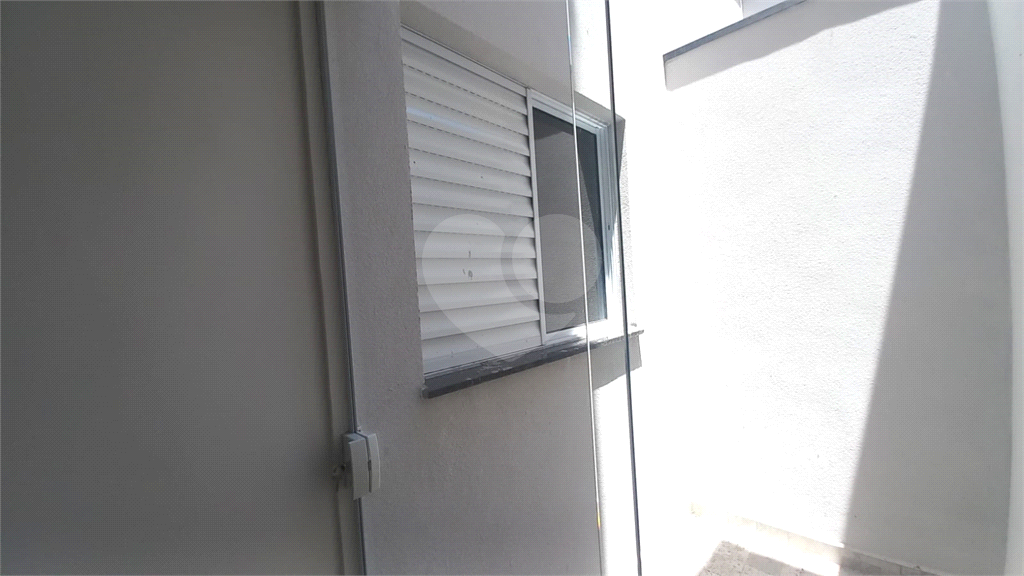 Apartamento à venda no Mandaqui localizado no térreo com um pequeno quintal.