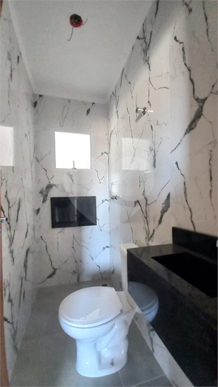 Apartamento à venda no Mandaqui localizado no térreo com um pequeno quintal.