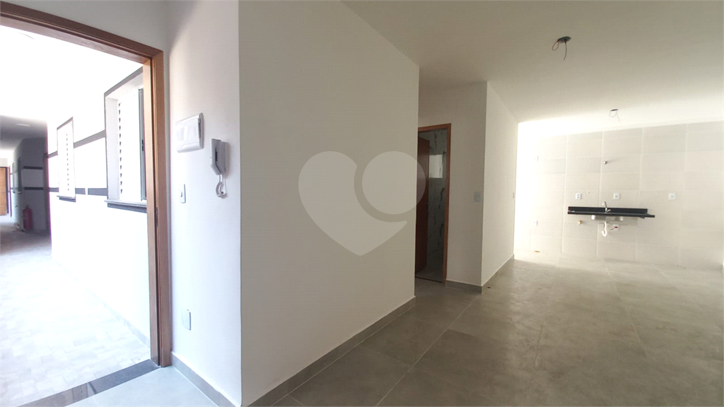 Apartamento à venda no Mandaqui localizado no térreo com um pequeno quintal.