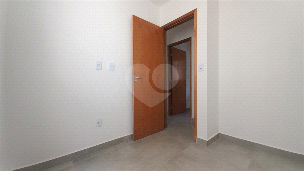 Apartamento à venda no Mandaqui localizado no térreo com um pequeno quintal.