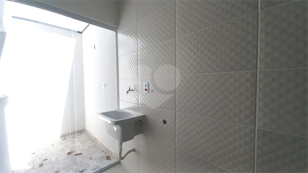 Apartamento à venda no Mandaqui localizado no térreo com um pequeno quintal.