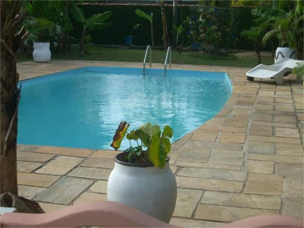 Casa na praia à venda | 1.080 m² | 3 dormitórios (2 suítes) | piscina | 12 vagas em Itanhaém/SP!