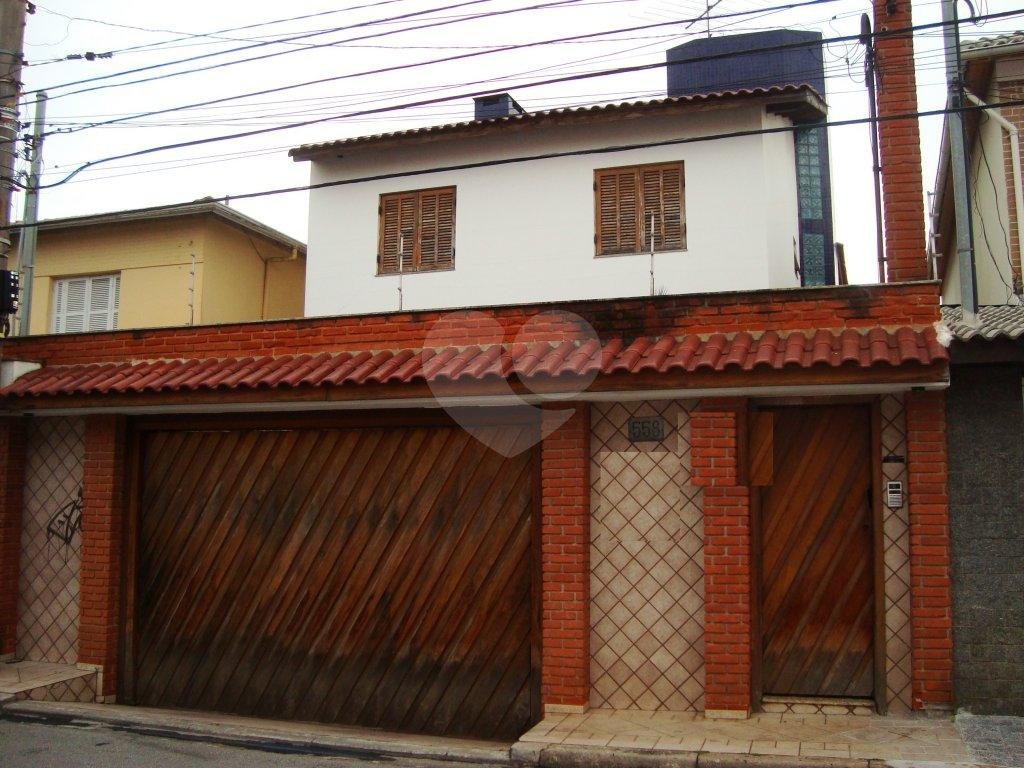 Sobrado à venda com 4 quartos, 340m² - Foto 1