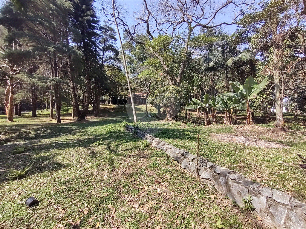 Terreno com 2 casas de 2 quartos e benfeitorias