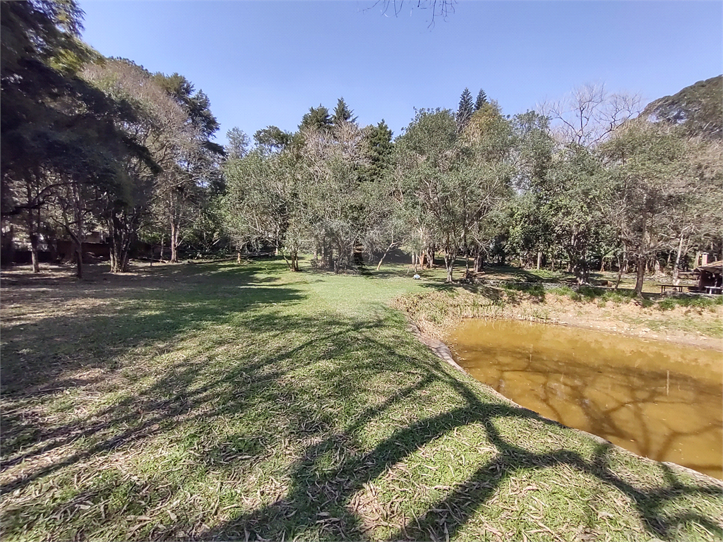 Terreno com 2 casas de 2 quartos e benfeitorias