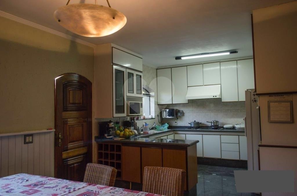 Casa térrea na Vila Irmãos Arnoni ao lado do Parque do Horto Florestal