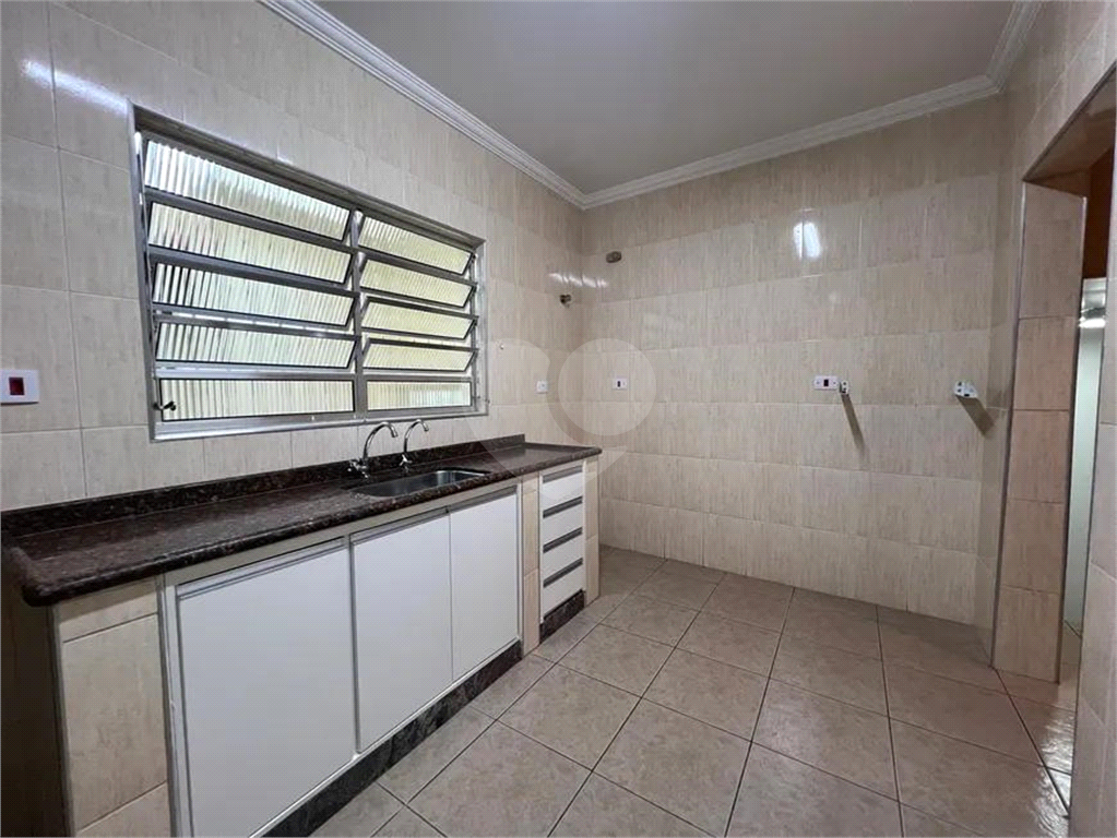 Santana casa térrea de fundos  sem garagem