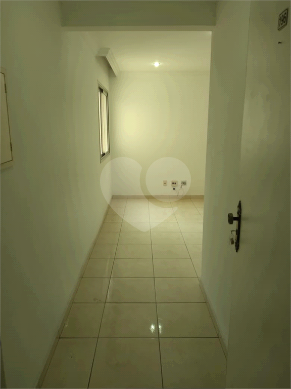Apartamento de 52m² com 2 dormitórios e vaga de garagem.