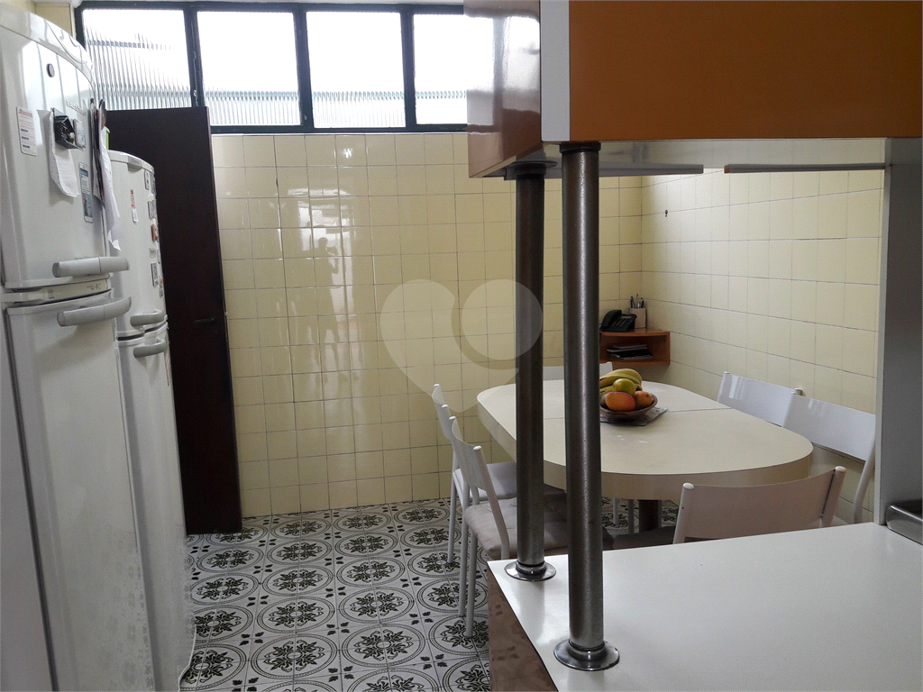 Terreno 414m² de esquina com casa térrea, Alto de Pinheiros, comercial/residencial