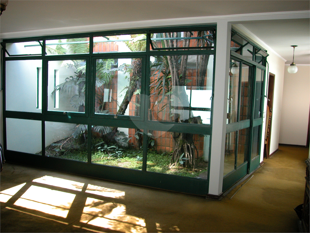 Terreno 414m² de esquina com casa térrea, Alto de Pinheiros, comercial/residencial