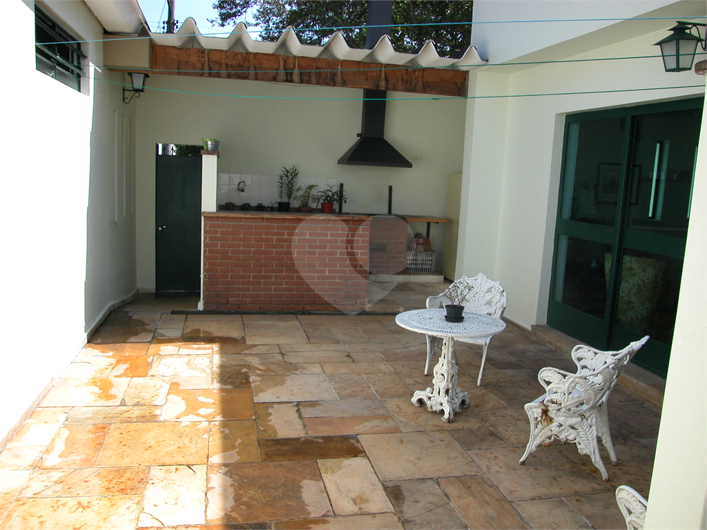 Terreno 414m² de esquina com casa térrea, Alto de Pinheiros, comercial/residencial