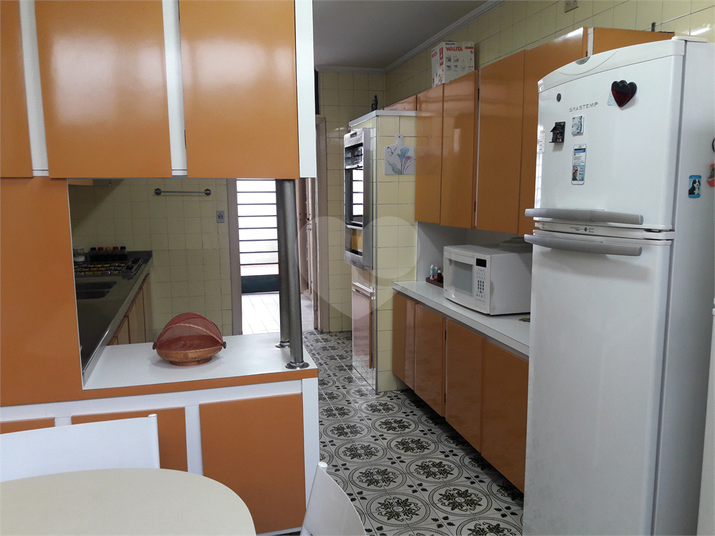 Terreno 414m² de esquina com casa térrea, Alto de Pinheiros, comercial/residencial