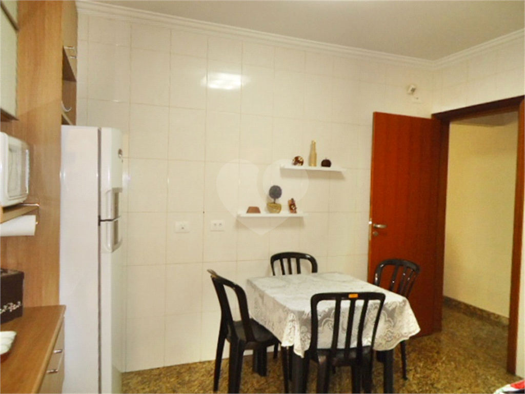 Casa à venda com 3 quartos, 222m² - Foto 7