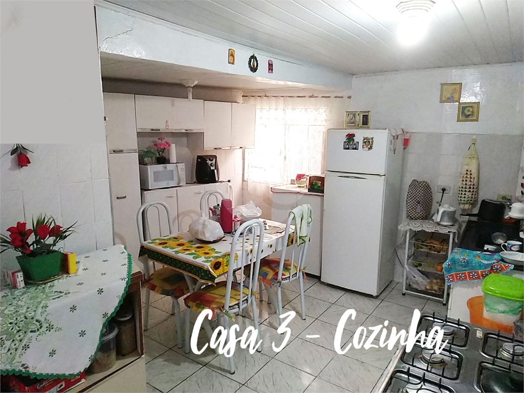 Terreno com 3 casas construídas no Jaraguá