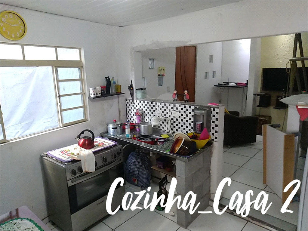 Terreno com 3 casas construídas no Jaraguá