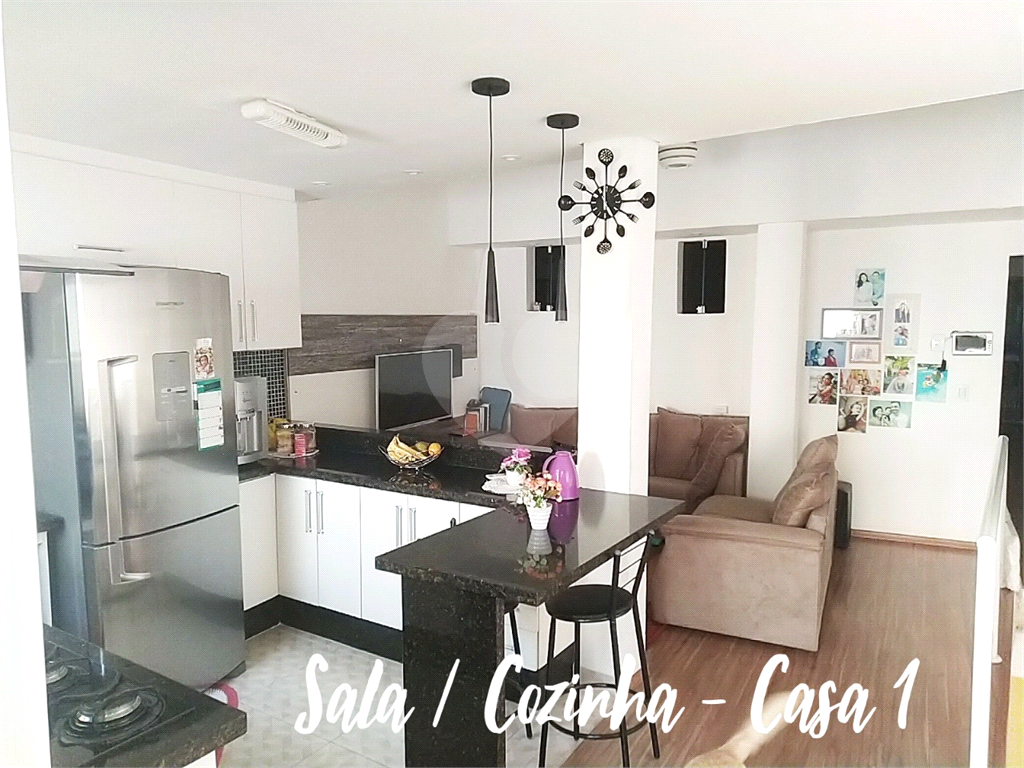 Terreno com 3 casas construídas no Jaraguá
