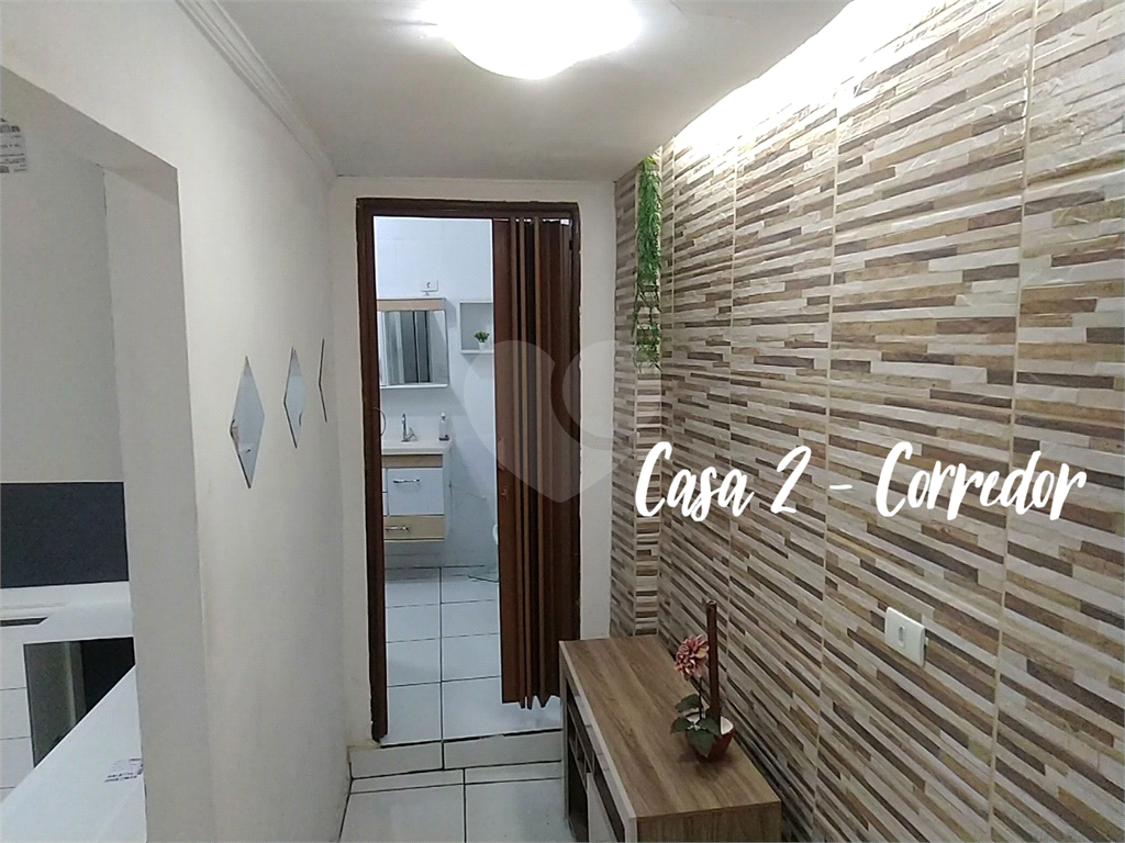 Terreno com 3 casas construídas no Jaraguá