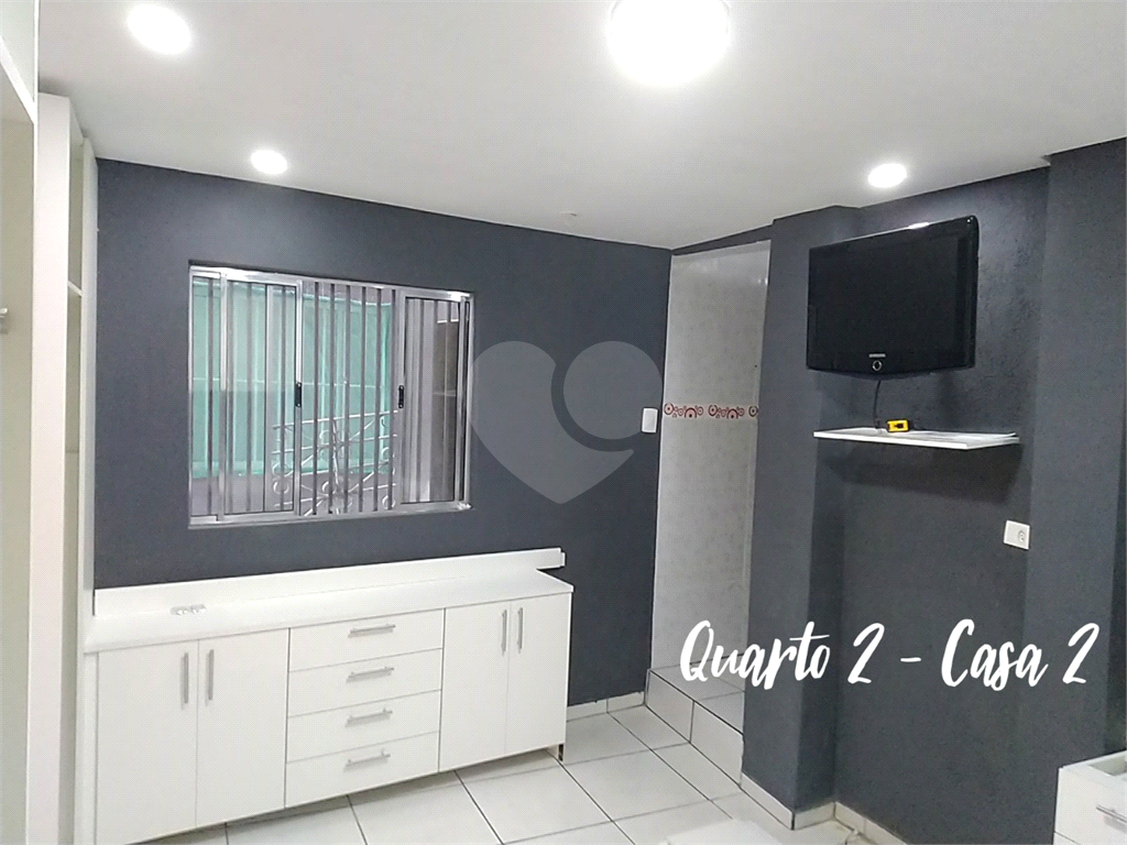 Terreno com 3 casas construídas no Jaraguá