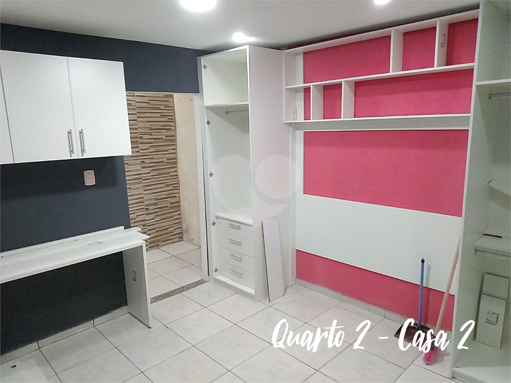 Terreno com 3 casas construídas no Jaraguá