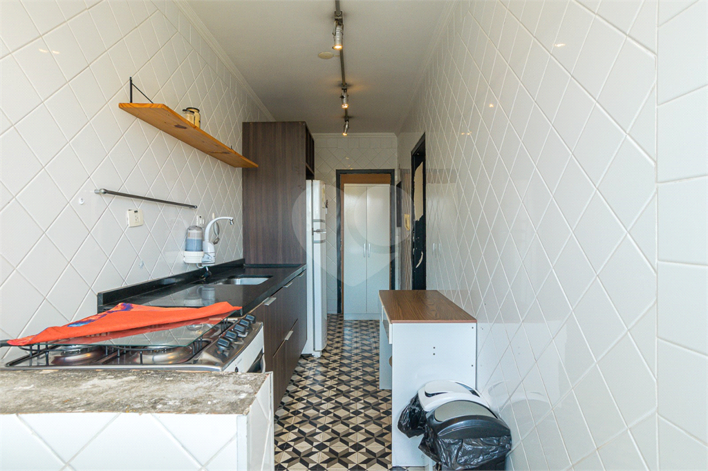 Imóvel de 88m² sala de estar de 2 ambientes 2 quartos 1 vaga Pinheiros