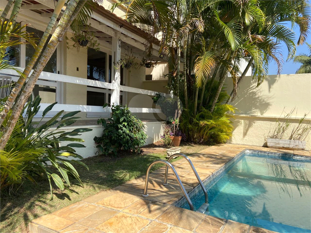 SOBRADO MARAVILHOSO NAS PALMAS DO TREMEMBÉ COM 3 SUITES COM ARMÁRIOS EMBUTIDOS, PISCINA, LAREIRA 