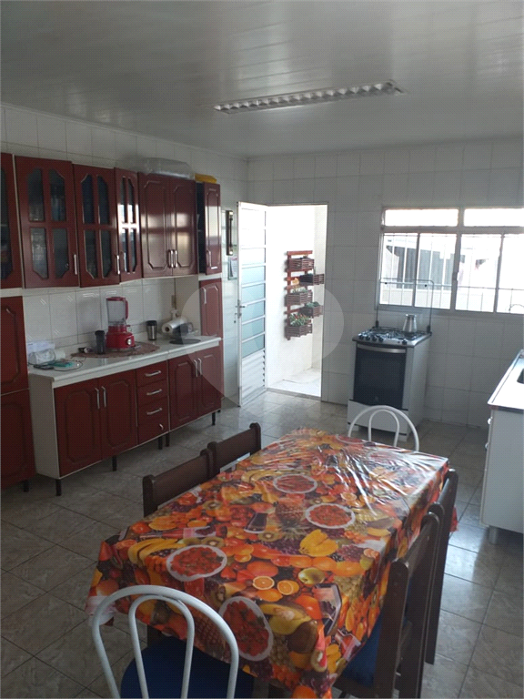 Ótimo terreno de 5 x 25 com 4 casas para renda!