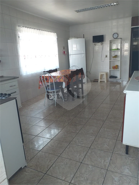Ótimo terreno de 5 x 25 com 4 casas para renda!
