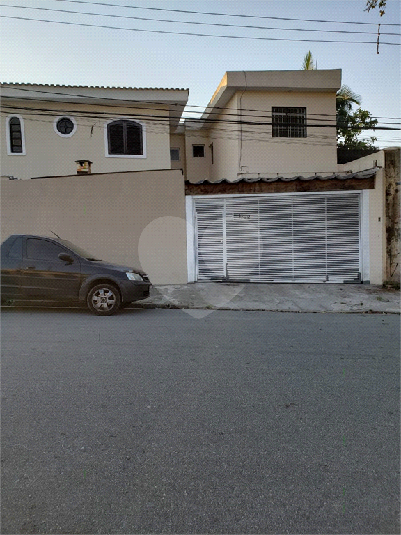 Grande Terreno com duas casas em Santo André.