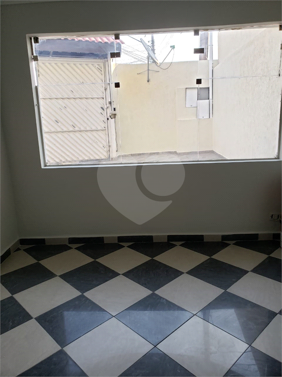 Grande Terreno com duas casas em Santo André.