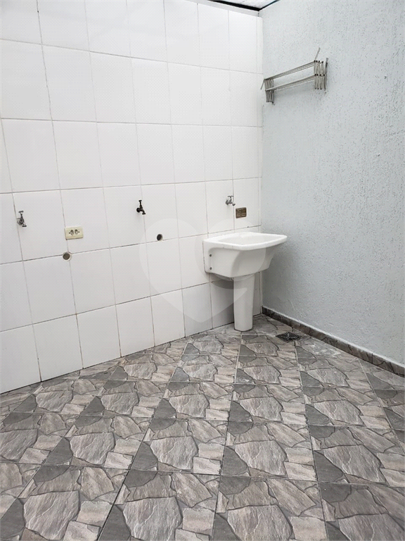 Grande Terreno com duas casas em Santo André.