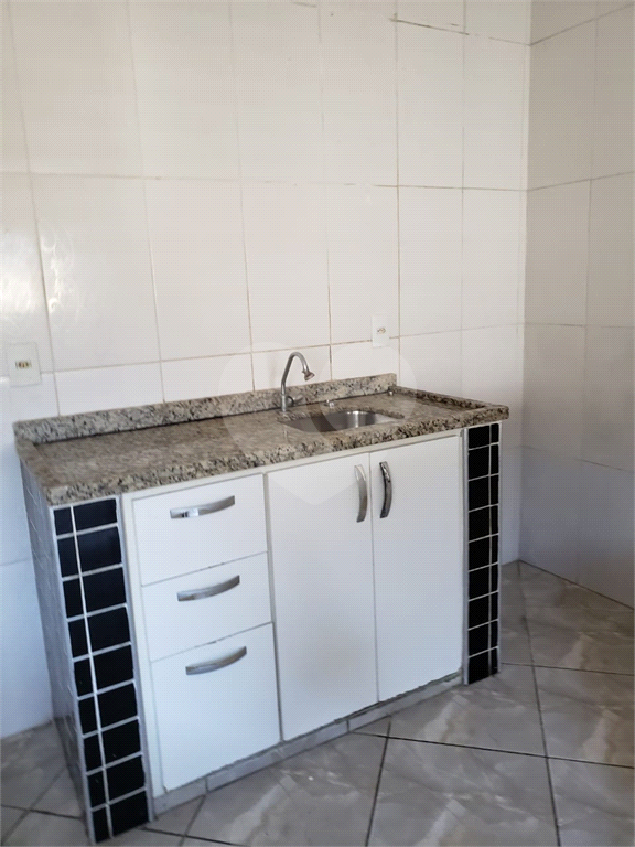 Grande Terreno com duas casas em Santo André.