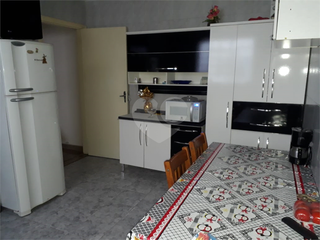 Terreno com duas casas no Mandaqui