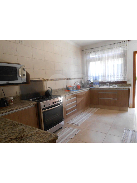 Casa térrea PARQUE RENATO MAIA, em terreno 10,00 x 33,00 E 250M²  de área construída.
