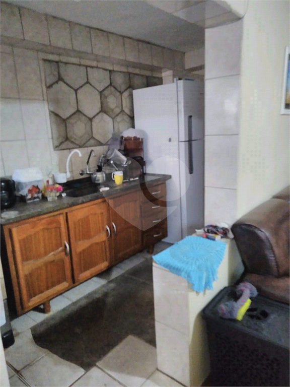 TERRENO COM CINCO CASAS. ÓTIMO PARA RENDA OU CONSTRUIR