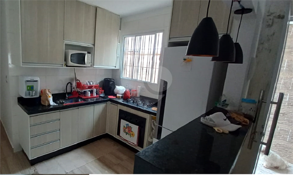Casa térrea à venda na Praia Grande - 145 m², 2 dormitórios e 2 vagas no bairro Maracanã (Zona 2)