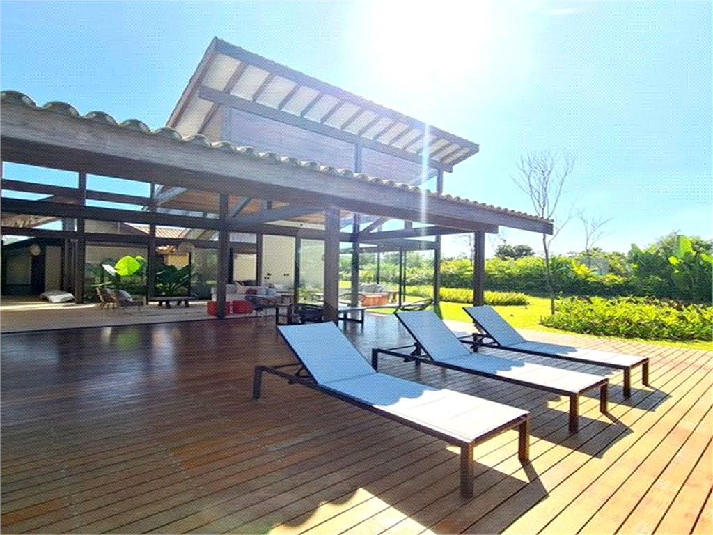 CASA CONDOMÍNIO FAZENDA BOA VISTA REFERÊNCIA NO PAÍS. 7 SUÍTES. NOVA. PRONTA PARA MORAR.
