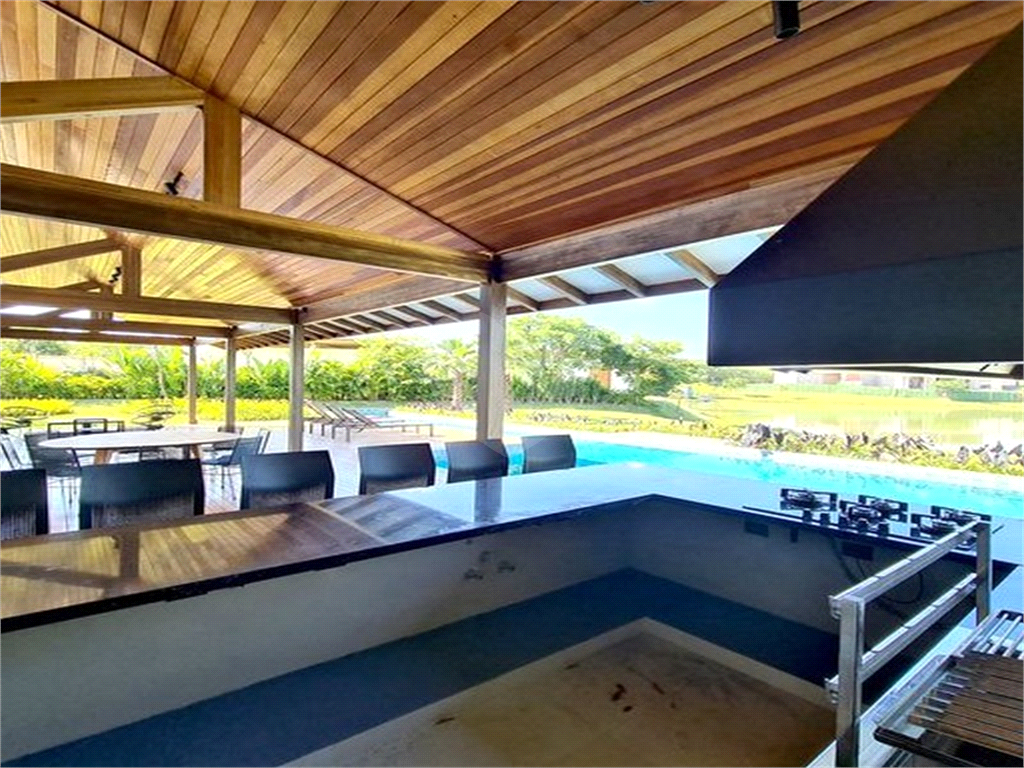 CASA CONDOMÍNIO FAZENDA BOA VISTA REFERÊNCIA NO PAÍS. 7 SUÍTES. NOVA. PRONTA PARA MORAR.