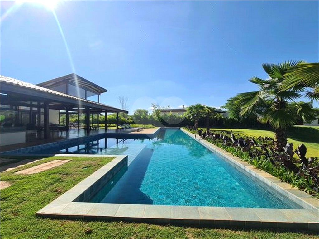 CASA CONDOMÍNIO FAZENDA BOA VISTA REFERÊNCIA NO PAÍS. 7 SUÍTES. NOVA. PRONTA PARA MORAR.