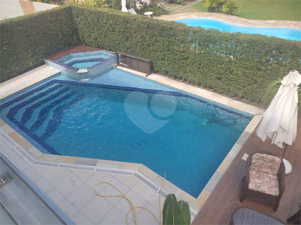 Sobrado em condomínio com 350m² à venda em Riviera de São Lourenço - 4 suítes e 3 vagas