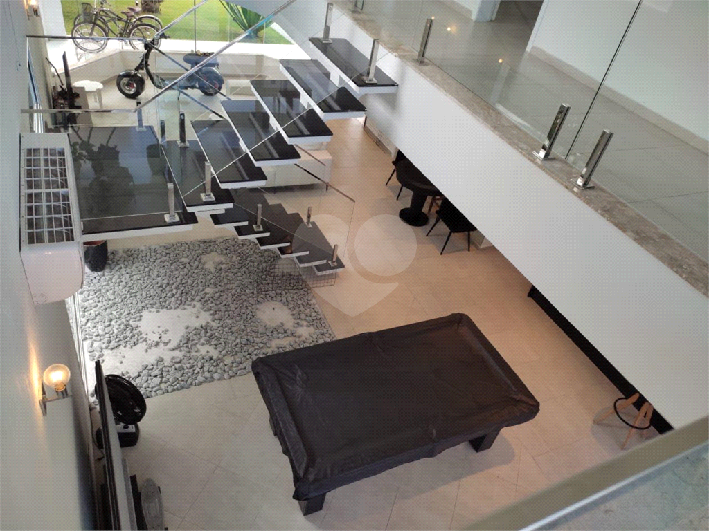 Sobrado em condomínio com 350m² à venda em Riviera de São Lourenço - 4 suítes e 3 vagas