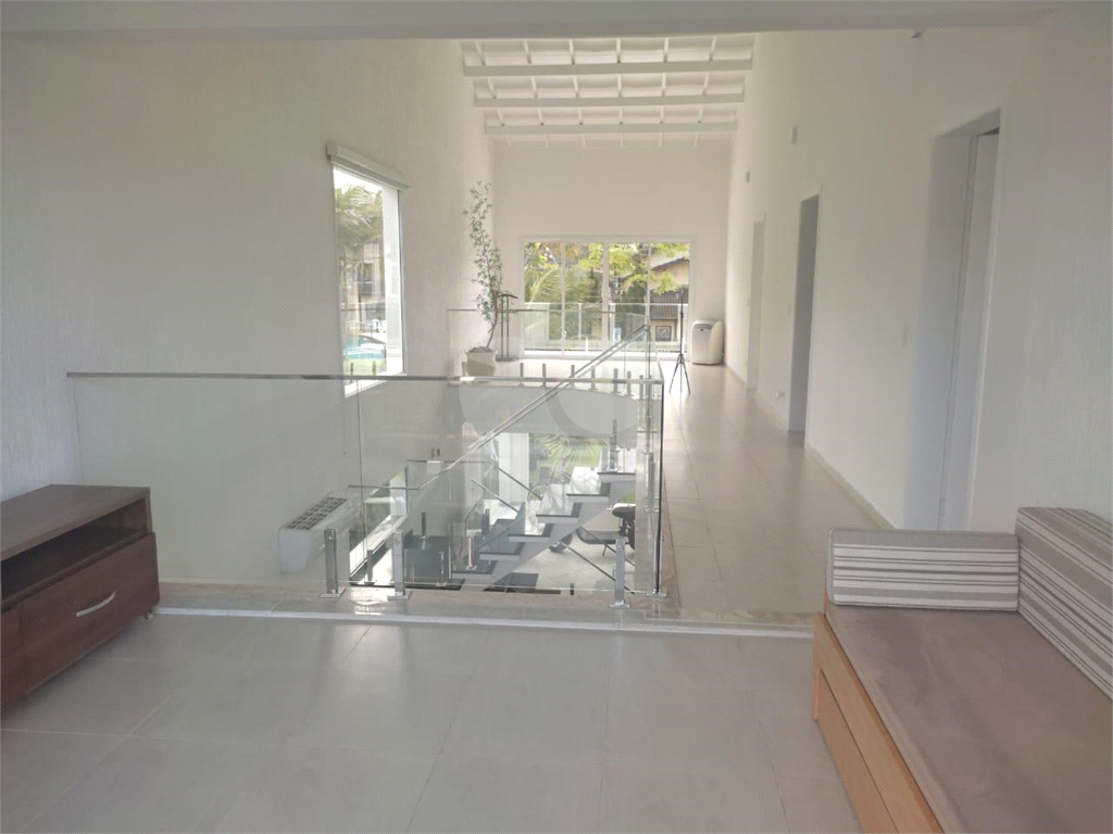 Sobrado em condomínio com 350m² à venda em Riviera de São Lourenço - 4 suítes e 3 vagas