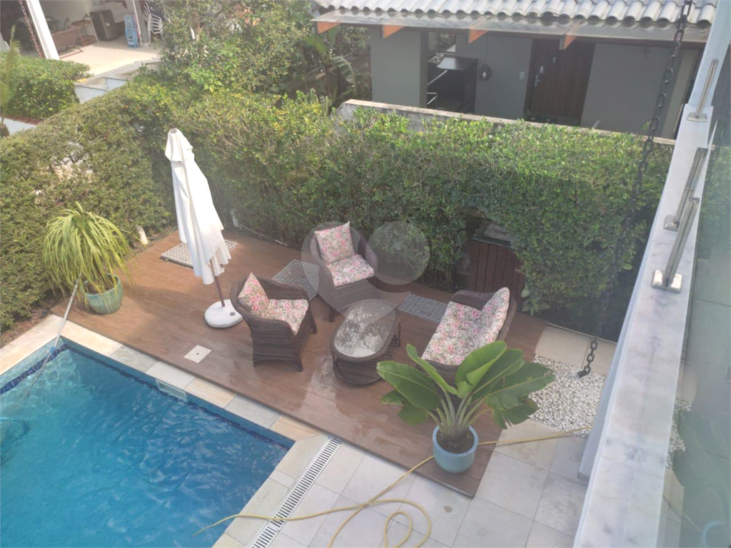 Sobrado em condomínio com 350m² à venda em Riviera de São Lourenço - 4 suítes e 3 vagas
