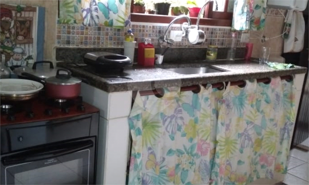 Casa à venda na Praia Grande - 135m² com 3 quartos e 4 vagas - Bairro Maracanã